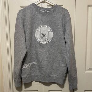 Gray Logo unisex sweat. Fleece and logo inside.